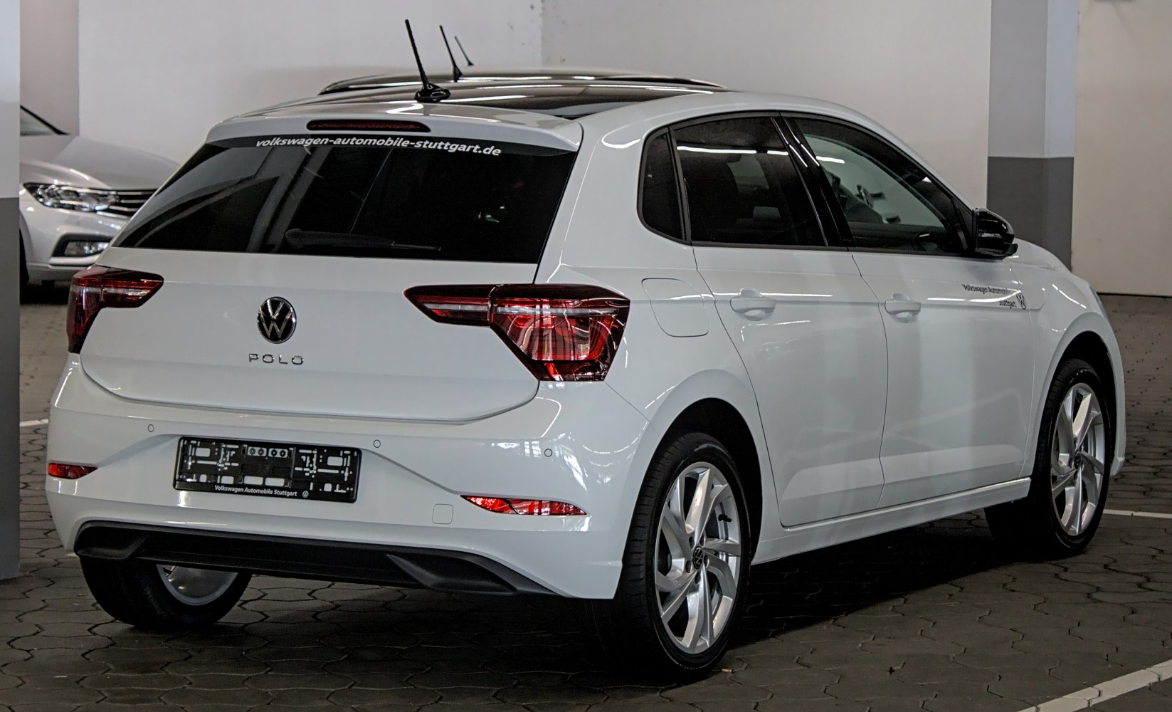 Rear view of a modern hatchback with distinctive tail lights and clean lines