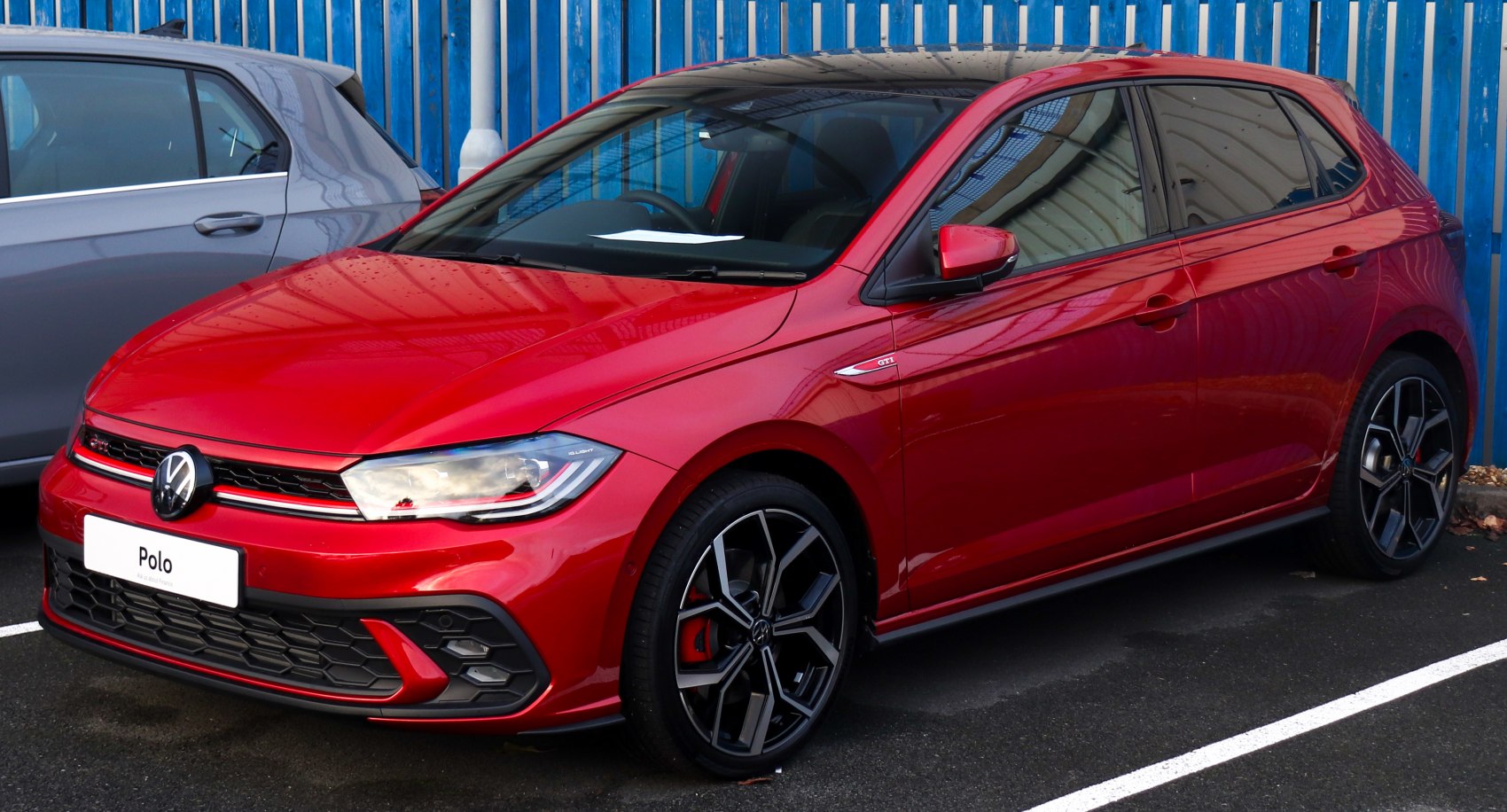 Sporty hatchback front with honeycomb grille and alloy wheels
