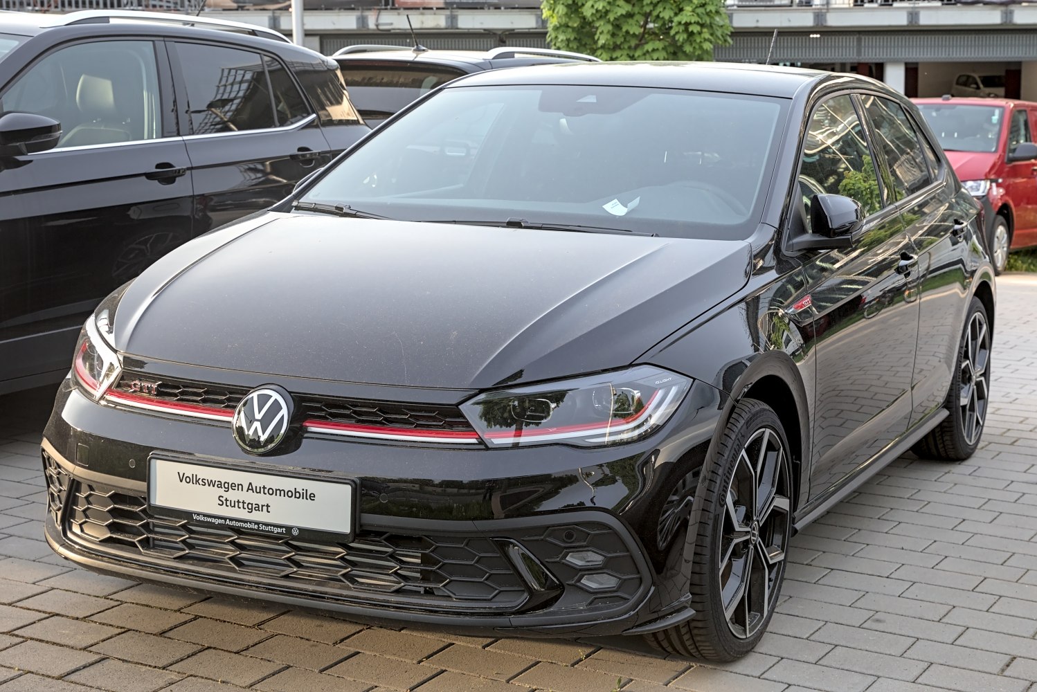 Front view of a sporty hatchback showing headlights and grille