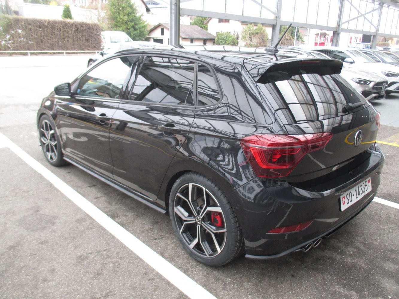 Rear and side profile with sporty wheels and rear taillights