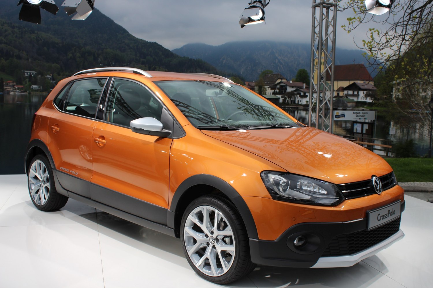 Orange compact crossover with rugged body cladding and alloy wheels