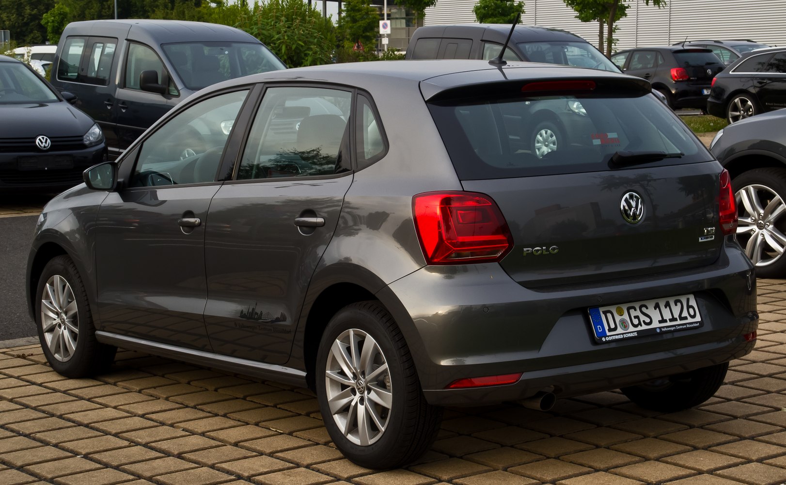 Rear side view of a hatchback with alloy wheels and distinct tail lights