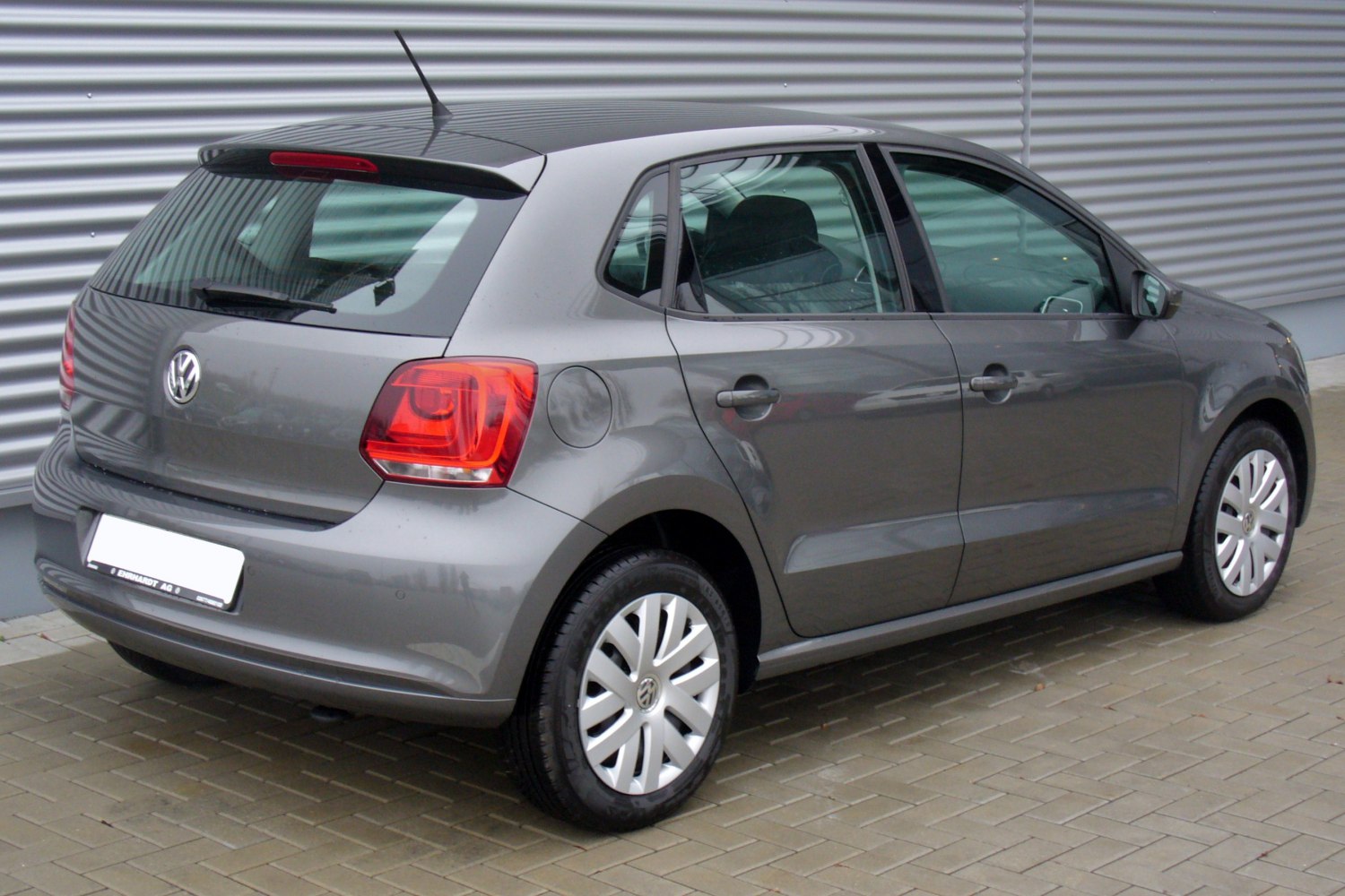 Rear side view of a 5-door hatchback with distinct rear lights