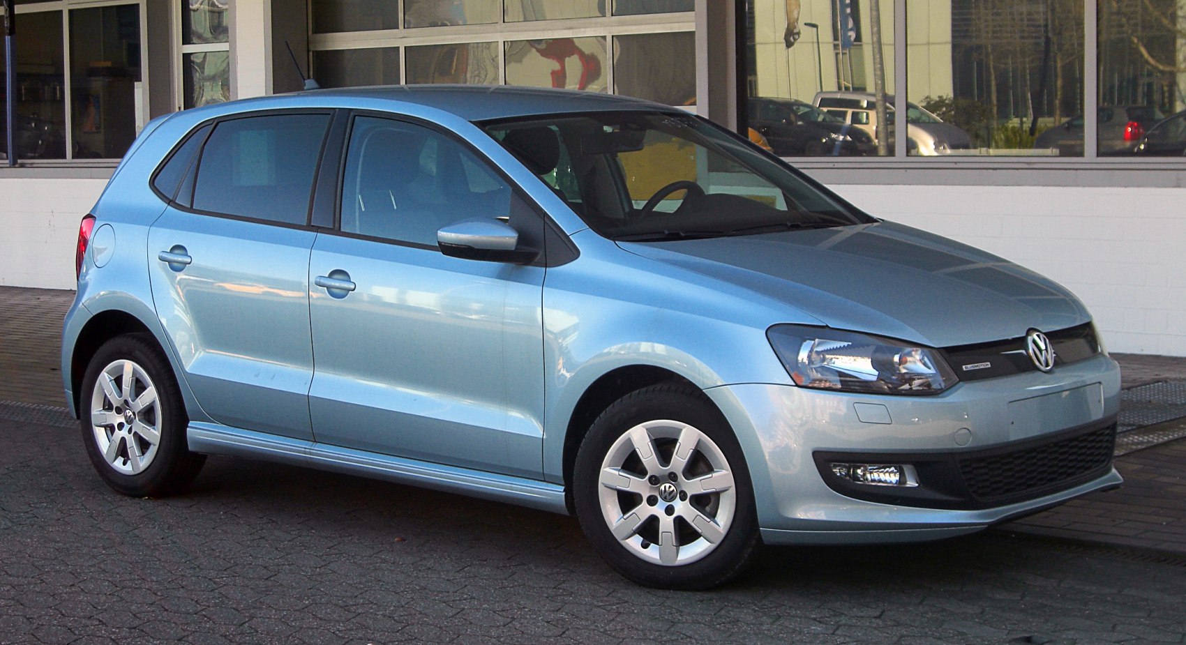 5-door hatchback side and front view with alloy wheels