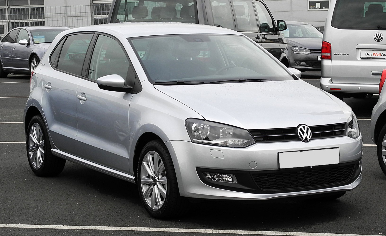 Silver 5-door hatchback front side view with alloy wheels