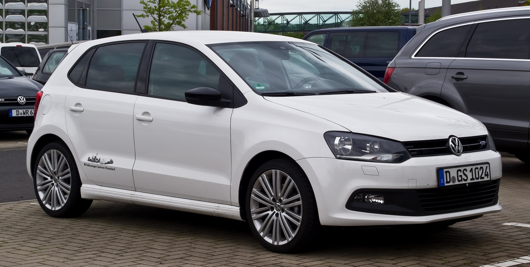 White 5-door hatchback with alloy wheels and sleek headlights