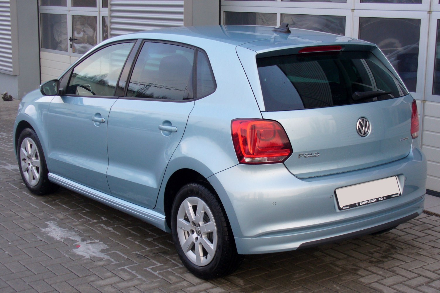 Rear and side view of a five-door hatchback with distinct tail lights