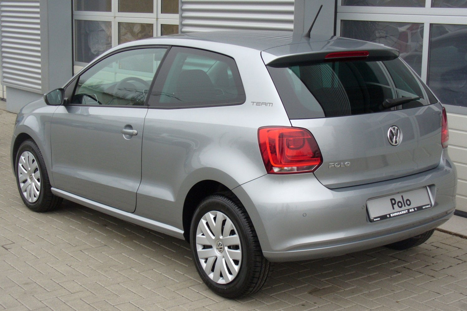 Silver 3-door hatchback rear view with distinct taillights