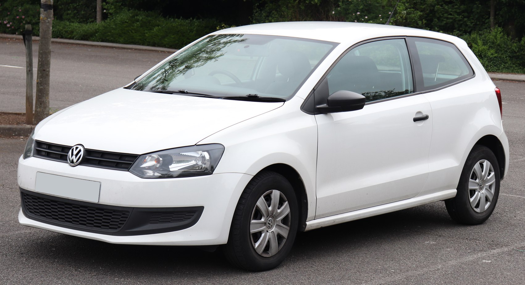 White 3-door hatchback with alloy wheels and sharp headlights