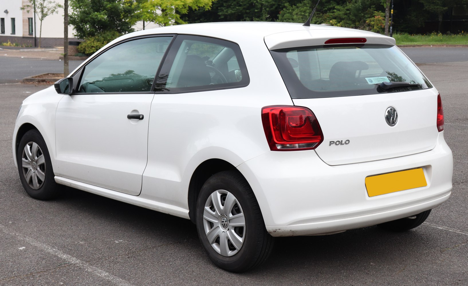 Rear and side view of a 3-door hatchback with distinctive taillights and compact shape
