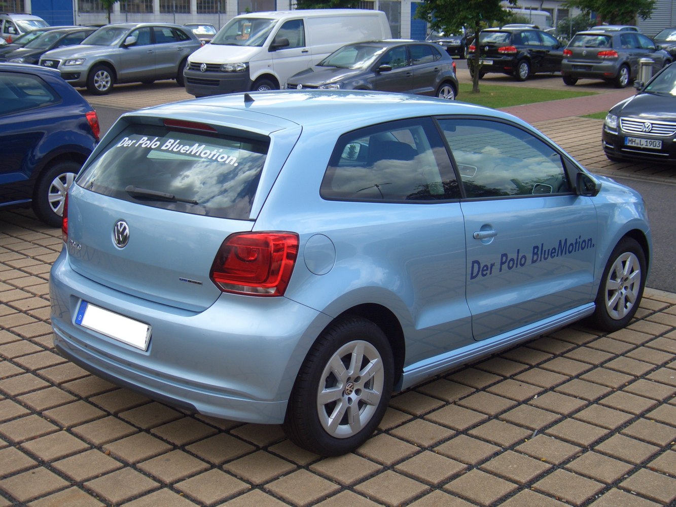 Rear and side view of a 3-door hatchback with BlueMotion branding