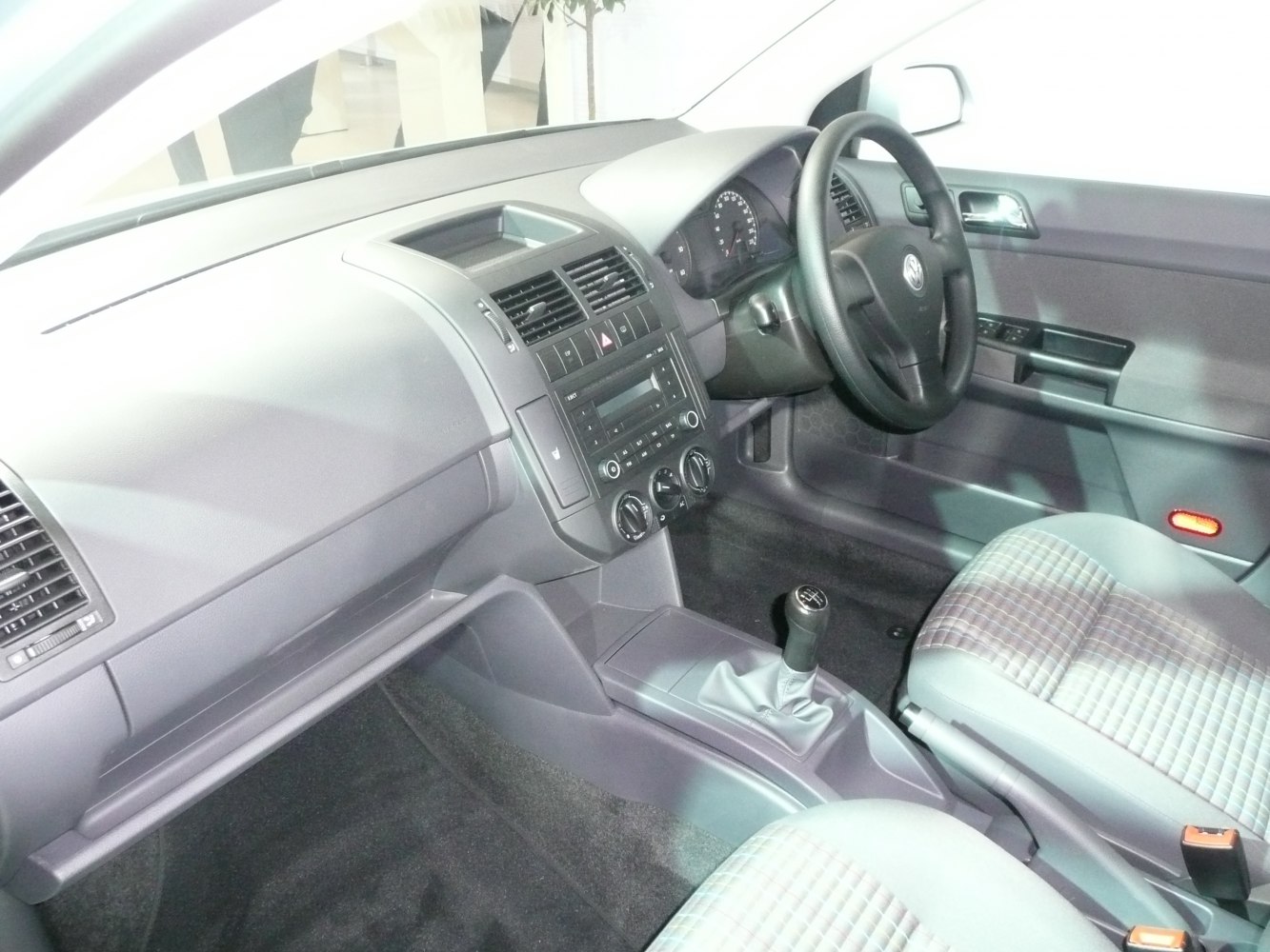 Interior dashboard and manual gearshift with fabric seats