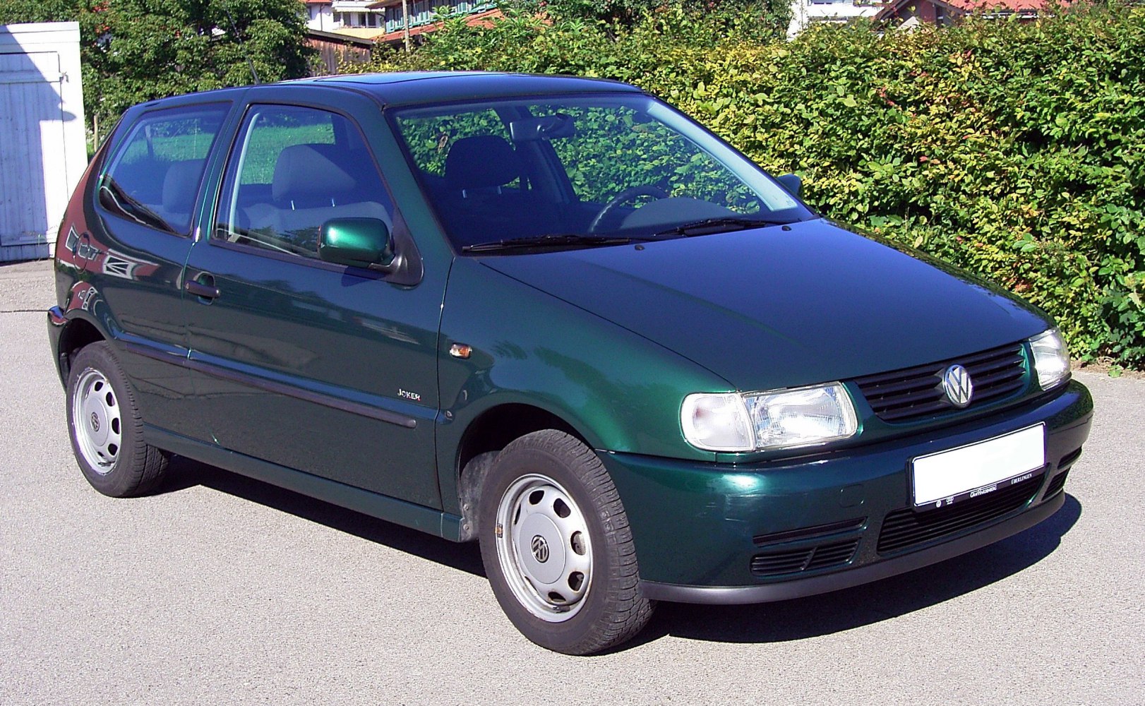 1990s compact hatchback front-side exterior view