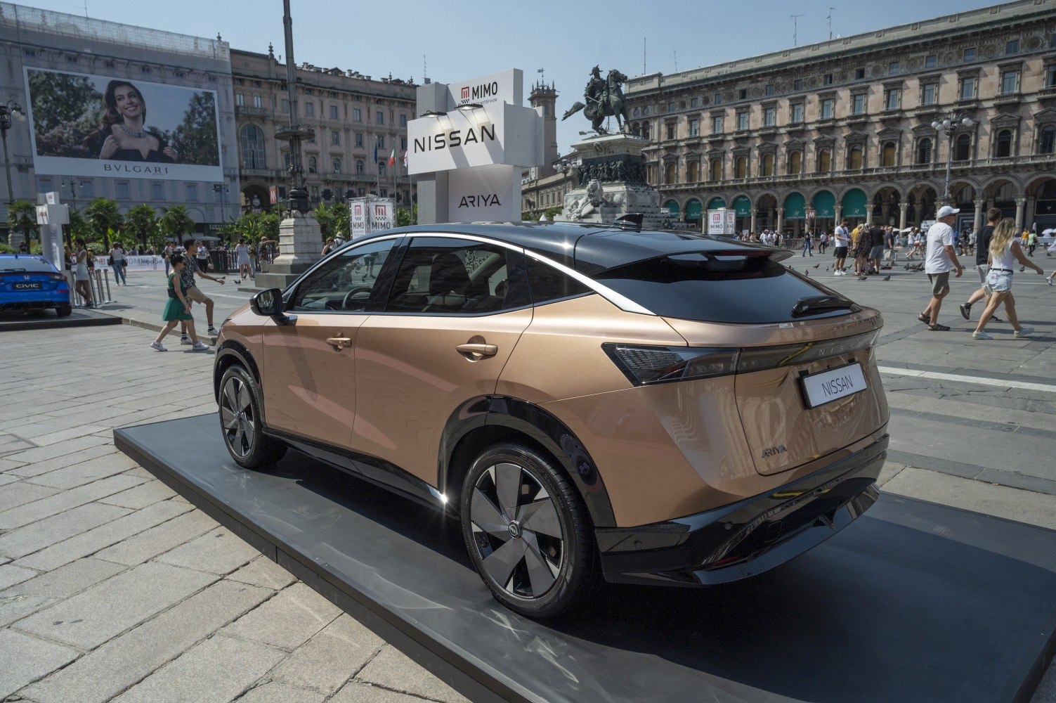 Sleek rear view of electric SUV with two-tone roof and sharp tail lights