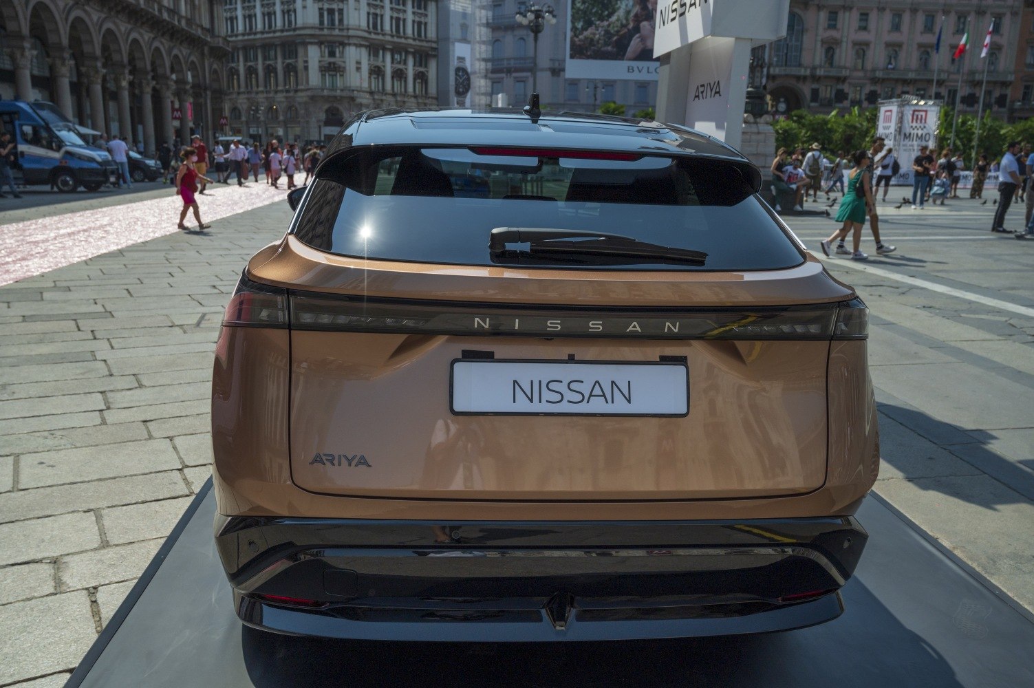 Rear view with continuous LED light bar and sleek hatchback design