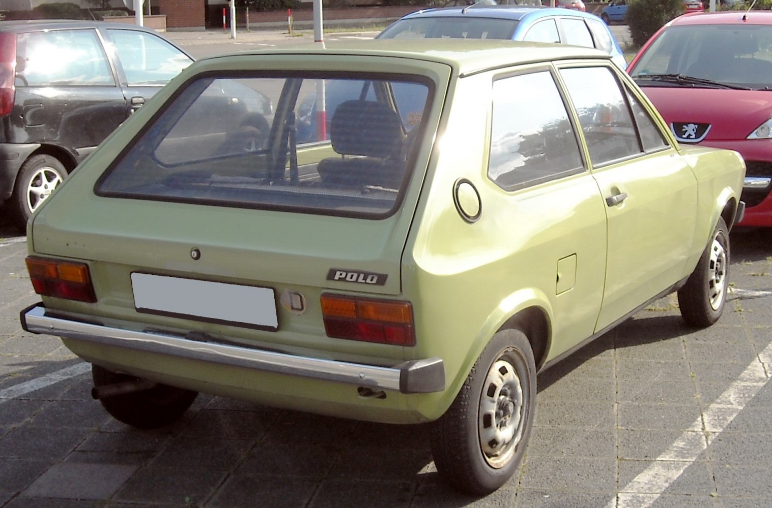 Retro hatchback rear view with chrome bumper and rectangular taillights