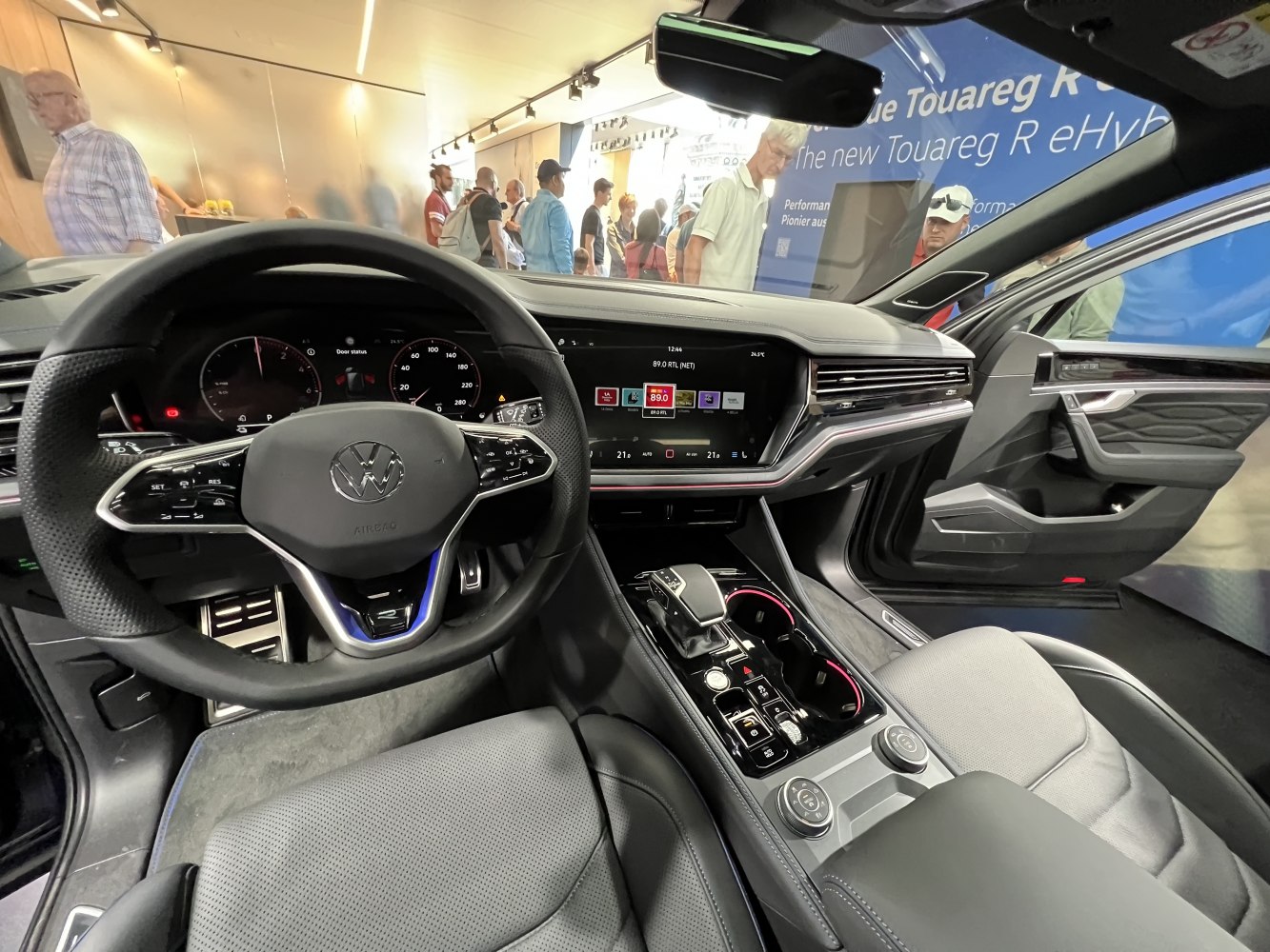 Modern SUV interior with digital dashboard and multifunction steering wheel