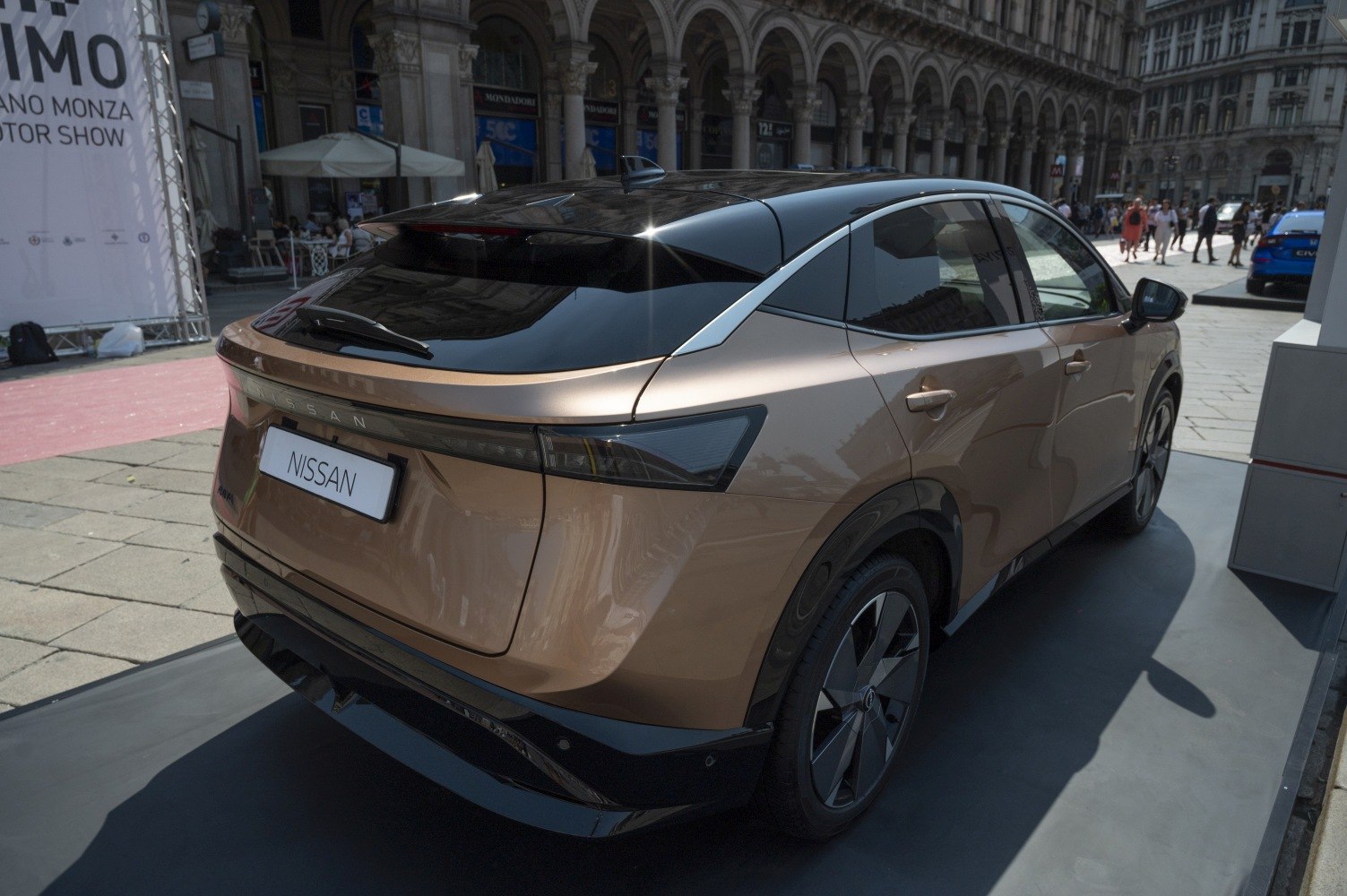 Rear view of a vehicle with sleek, continuous taillight design and sharp angular styling.
