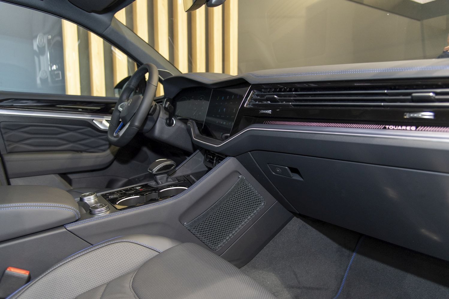 Modern digital dashboard and luxury interior with premium upholstery and infotainment system.