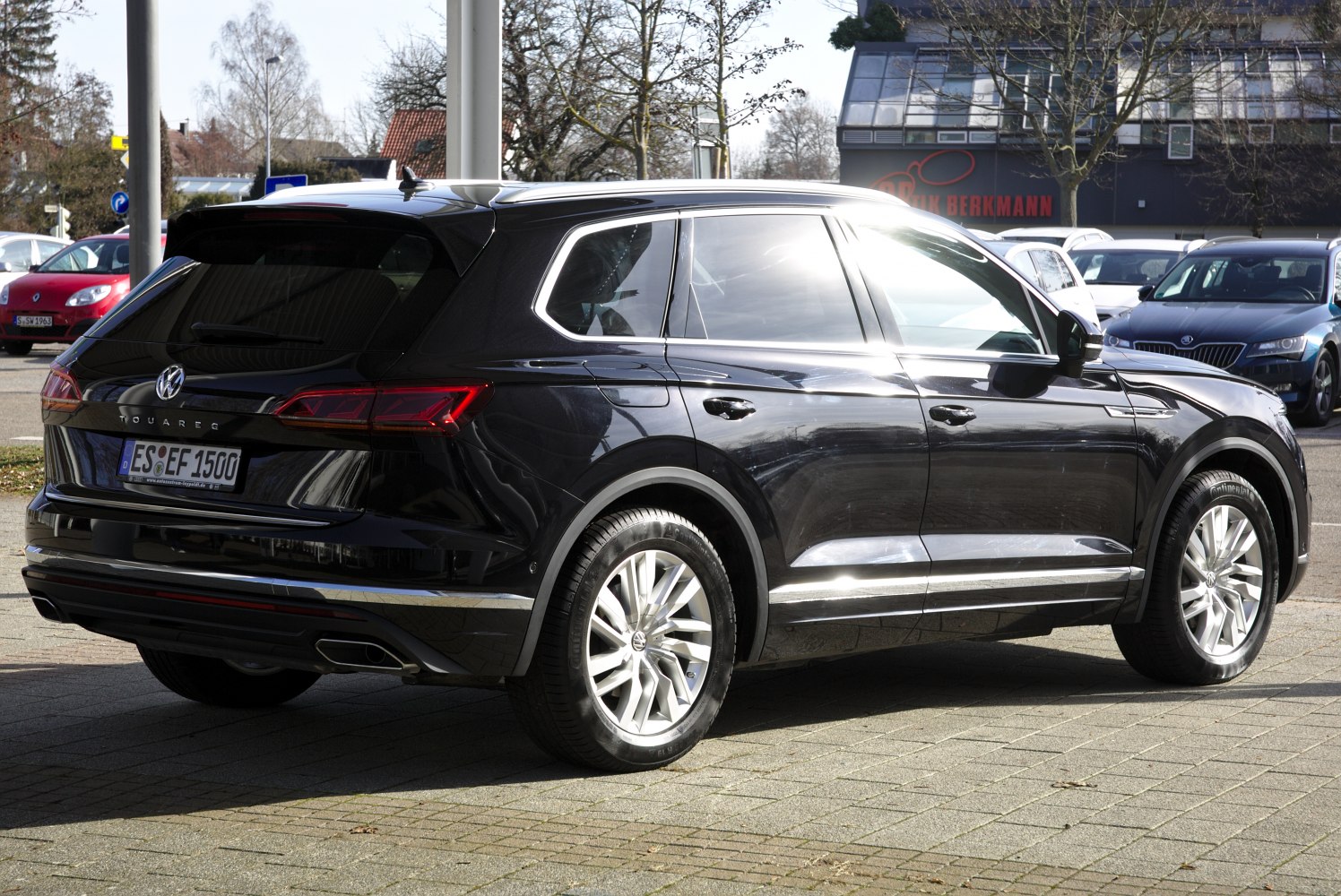 Rear and side view of SUV with sleek taillights and alloy wheels.