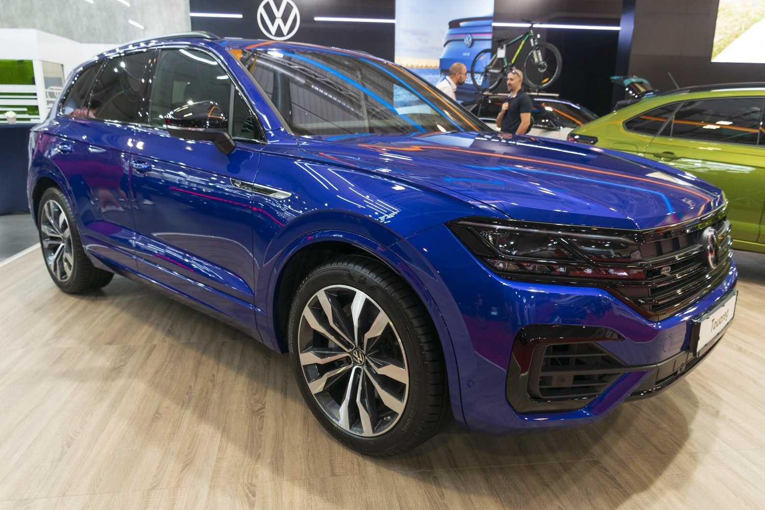 Front side view with sleek headlights and alloy wheels