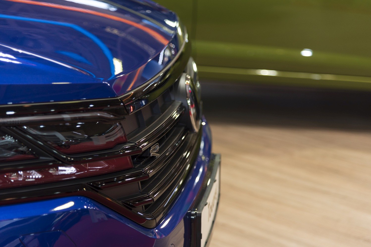 Close-up of front grille and headlight