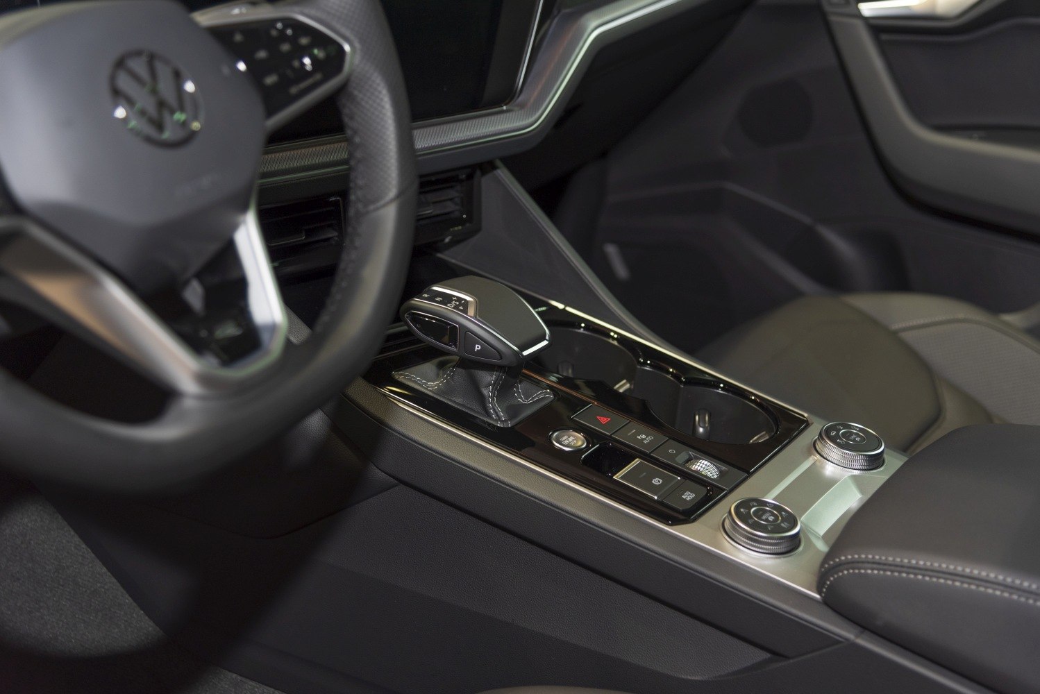 Interior gear shift and control buttons of a modern SUV