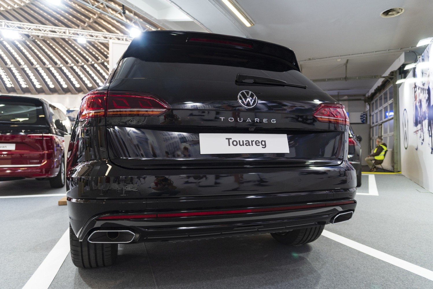 Rear view of a modern SUV with LED taillights and dual exhaust tips