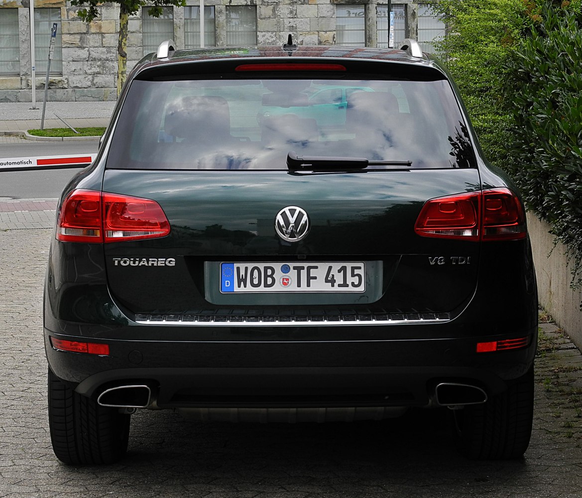 Rear view of SUV with distinctive taillights and dual exhaust pipes