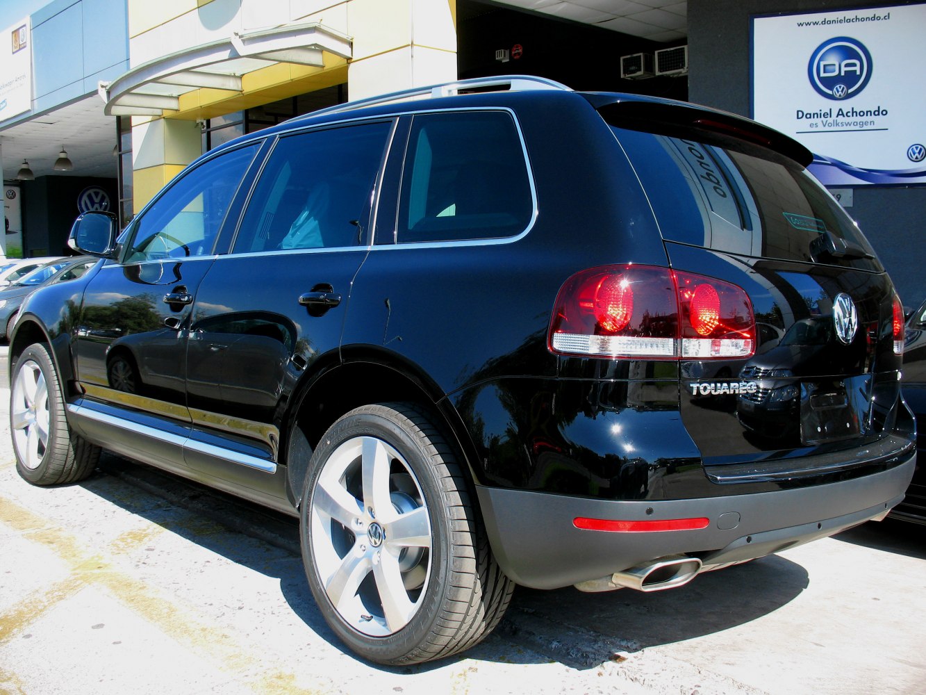 Rear and side view of SUV showing taillights and alloy wheels