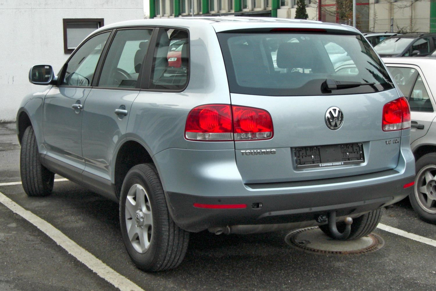 Rear view of SUV with distinctive taillights and visible tow hook