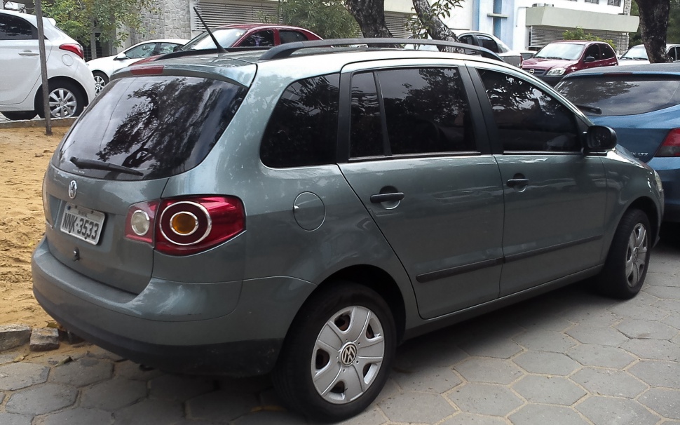 Rear side view with tinted windows and distinctive taillights