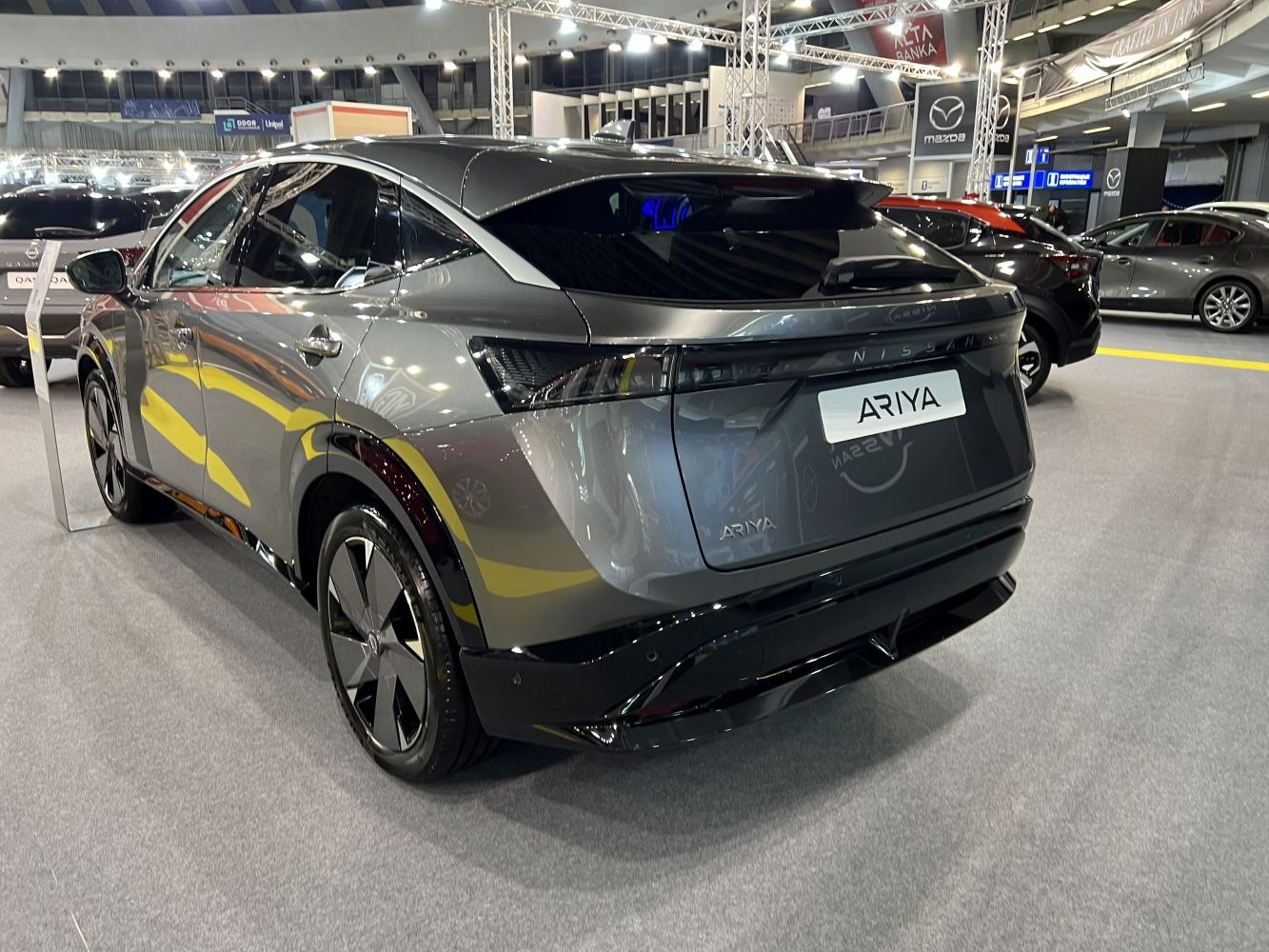 Sleek rear design of a modern electric SUV with stylish tail lights and aerodynamic elements.