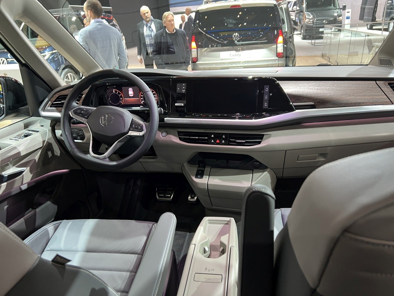 Modern dashboard and digital instrument cluster with multifunction steering wheel