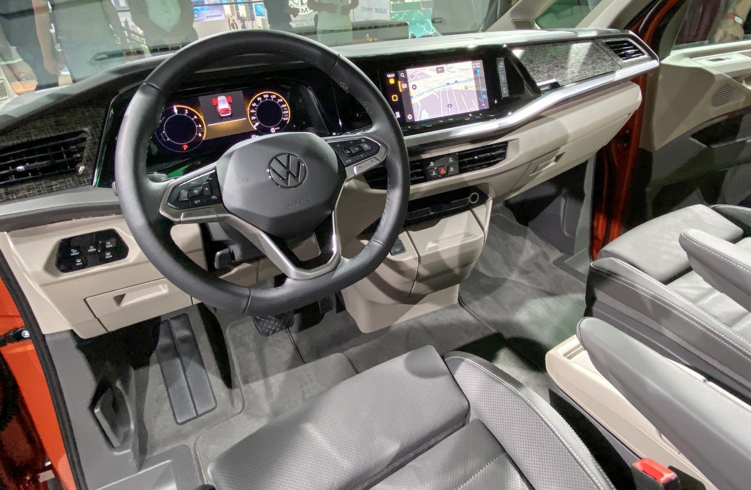 Digital dashboard and infotainment touchscreen with steering wheel controls