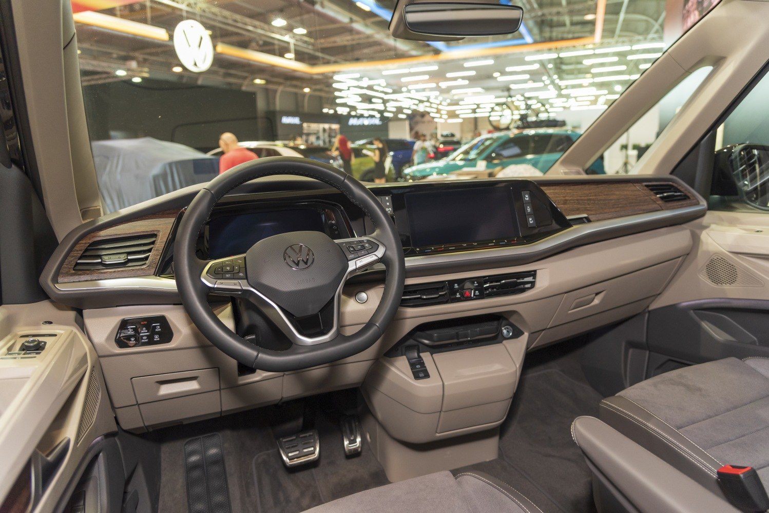 Multifunction steering wheel and modern dashboard with wood trim