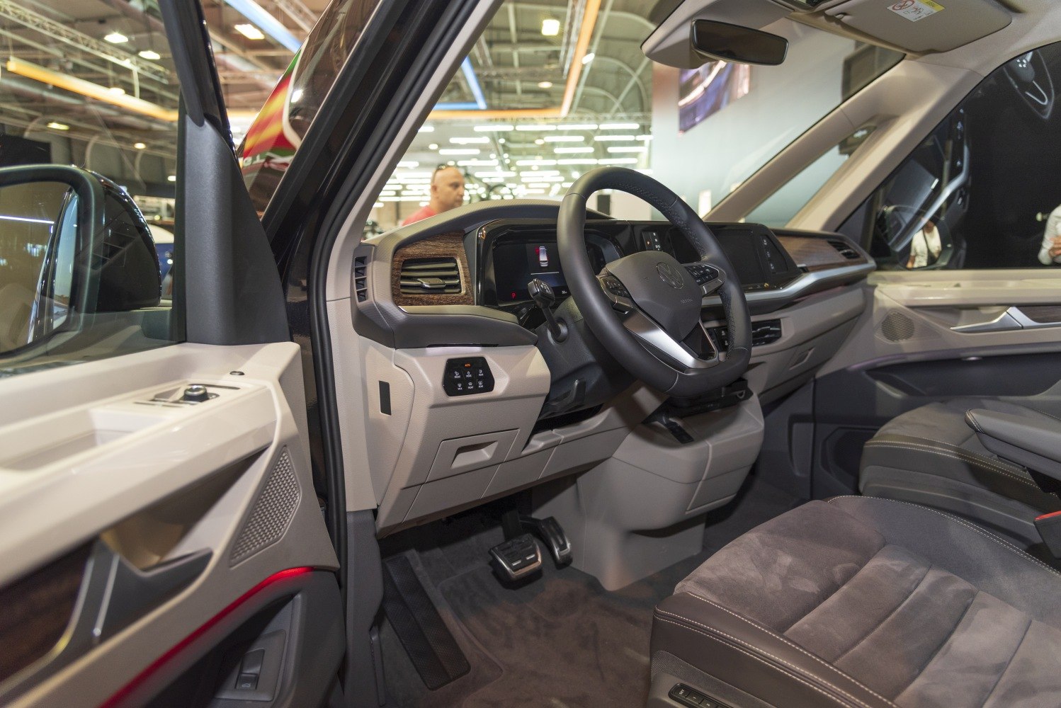 Modern dashboard and multifunctional steering wheel in vehicle interior