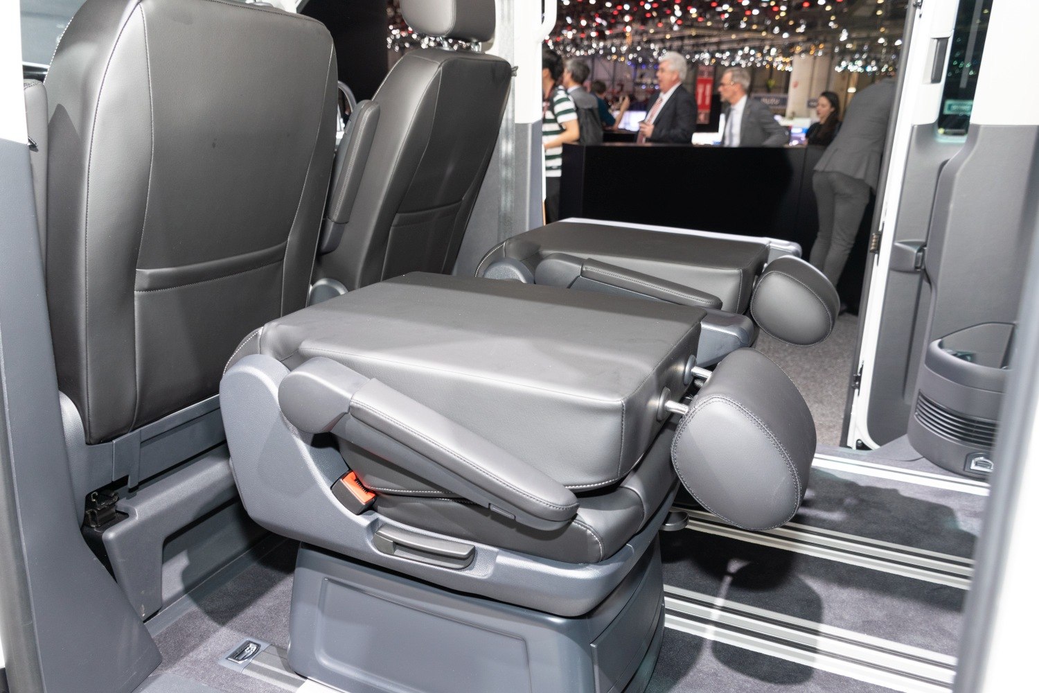 Folded rear seats in modern van interior for flexible space