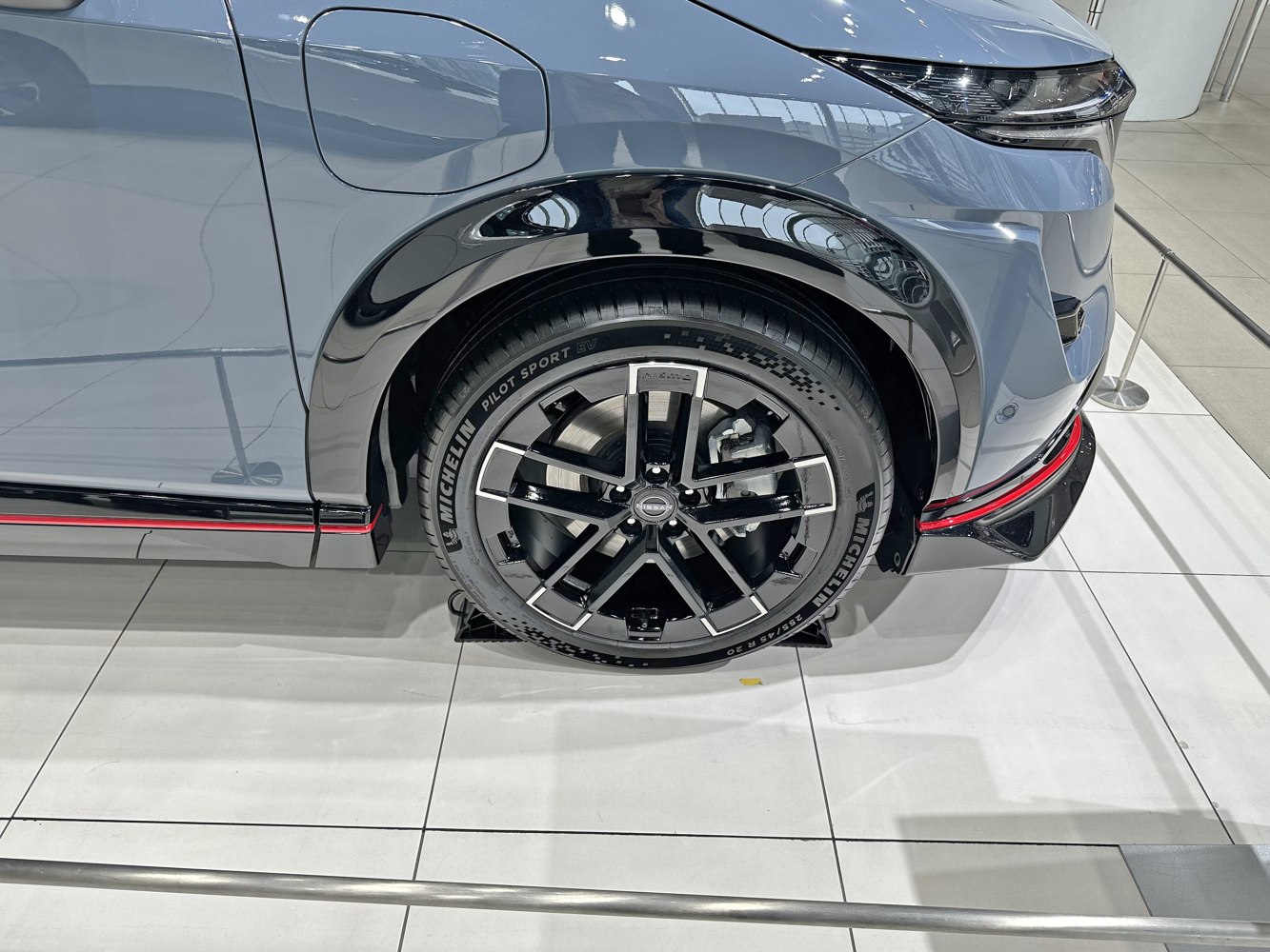 Front alloy wheel with Michelin Pilot Sport EV and sleek fender design