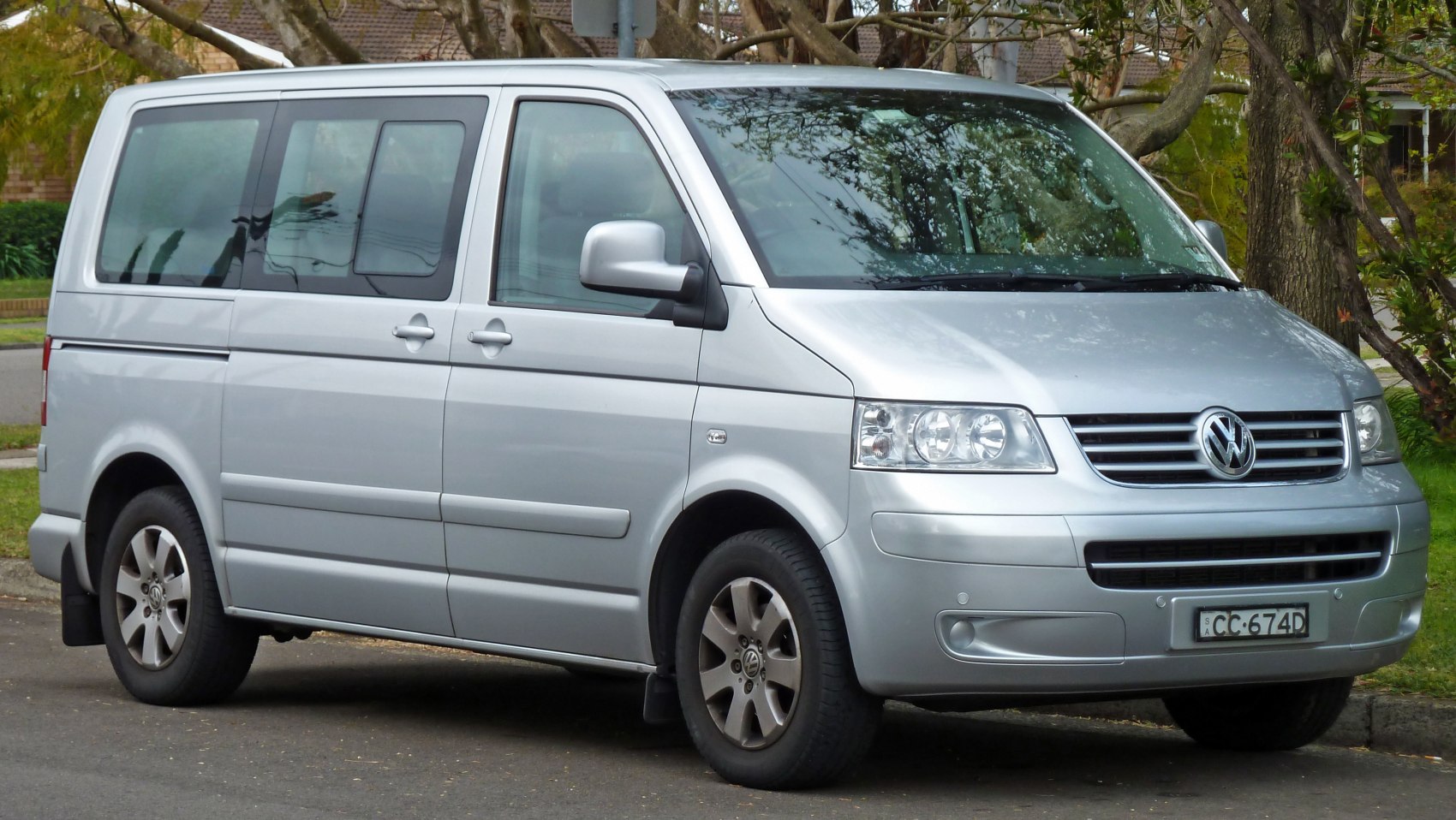Silver van side and front view with sliding doors and alloy wheels