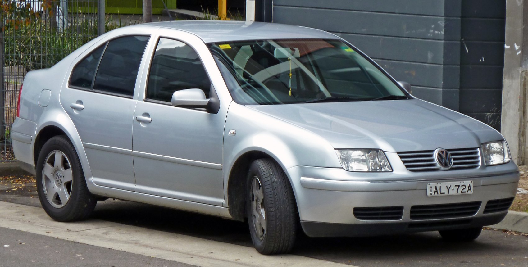 Silver sedan with alloy wheels front side view