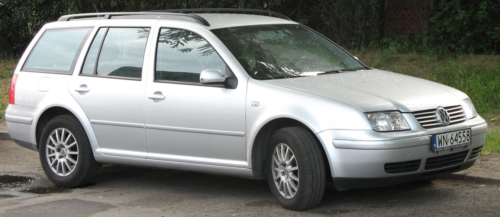 Silver station wagon with alloy wheels and roof rails