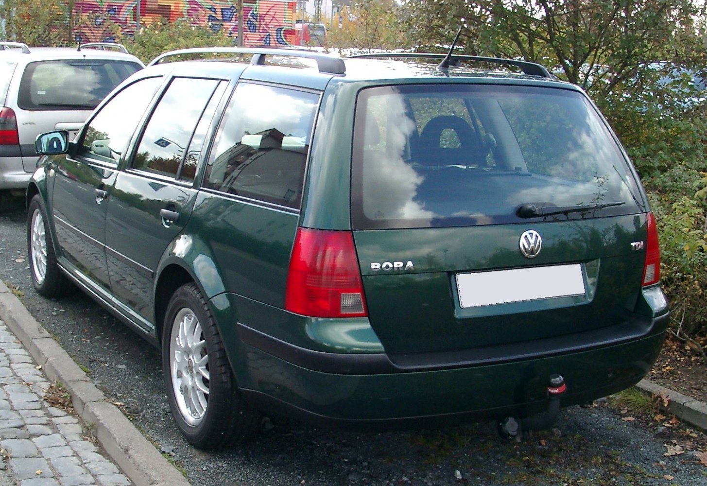 Rear view of station wagon with roof rails and tail lights