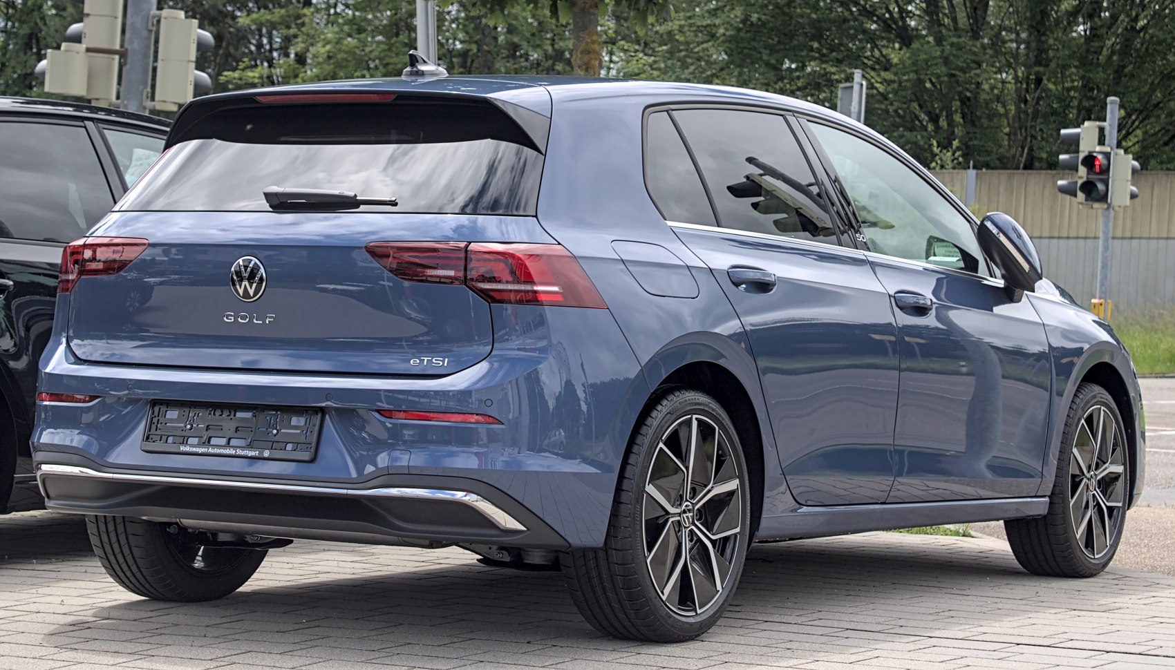 Rear view with modern taillights and stylish alloy wheels