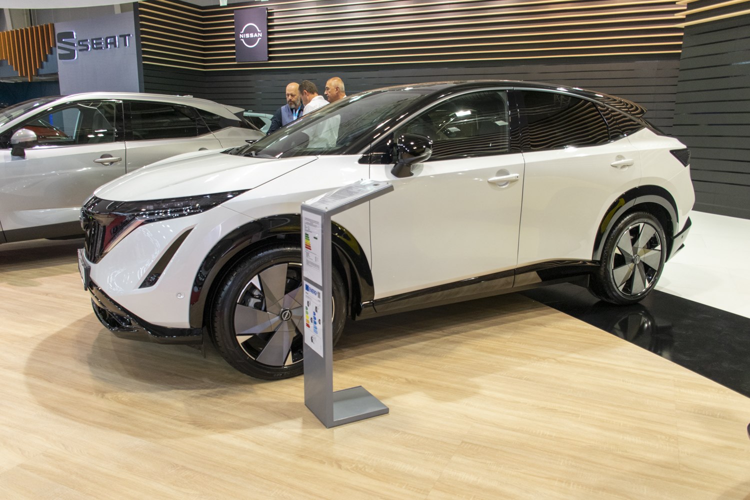 Sleek electric SUV with aerodynamic wheels and two-tone body design