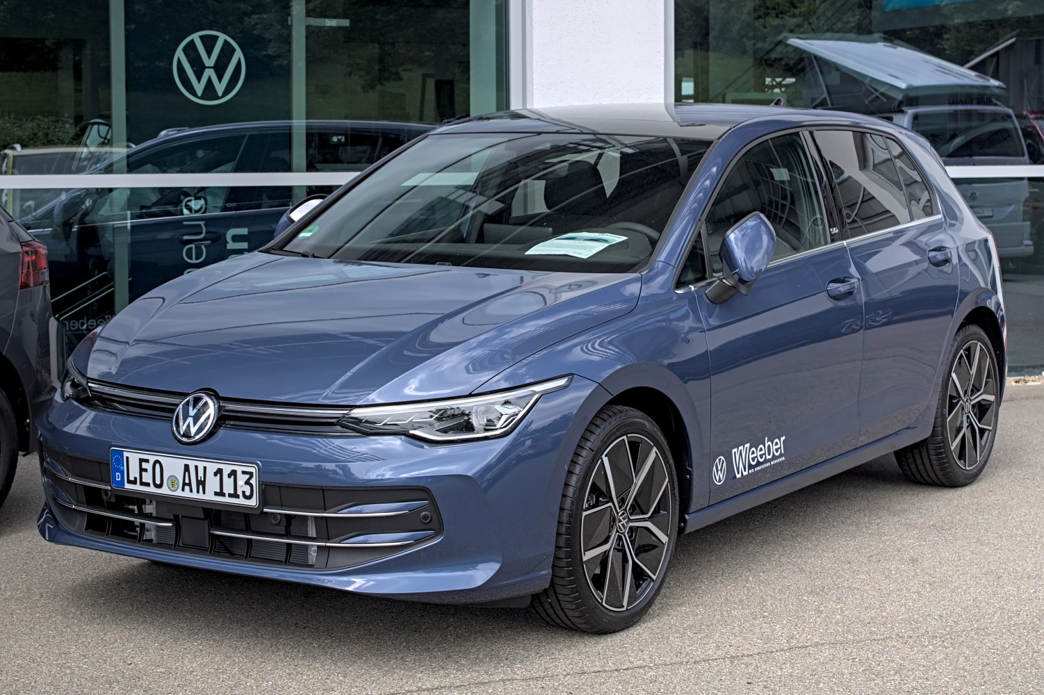 Front side view of a hatchback with LED headlights and alloy wheels