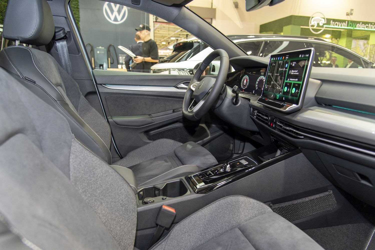 Digital instrument cluster and central touchscreen display in modern car interior