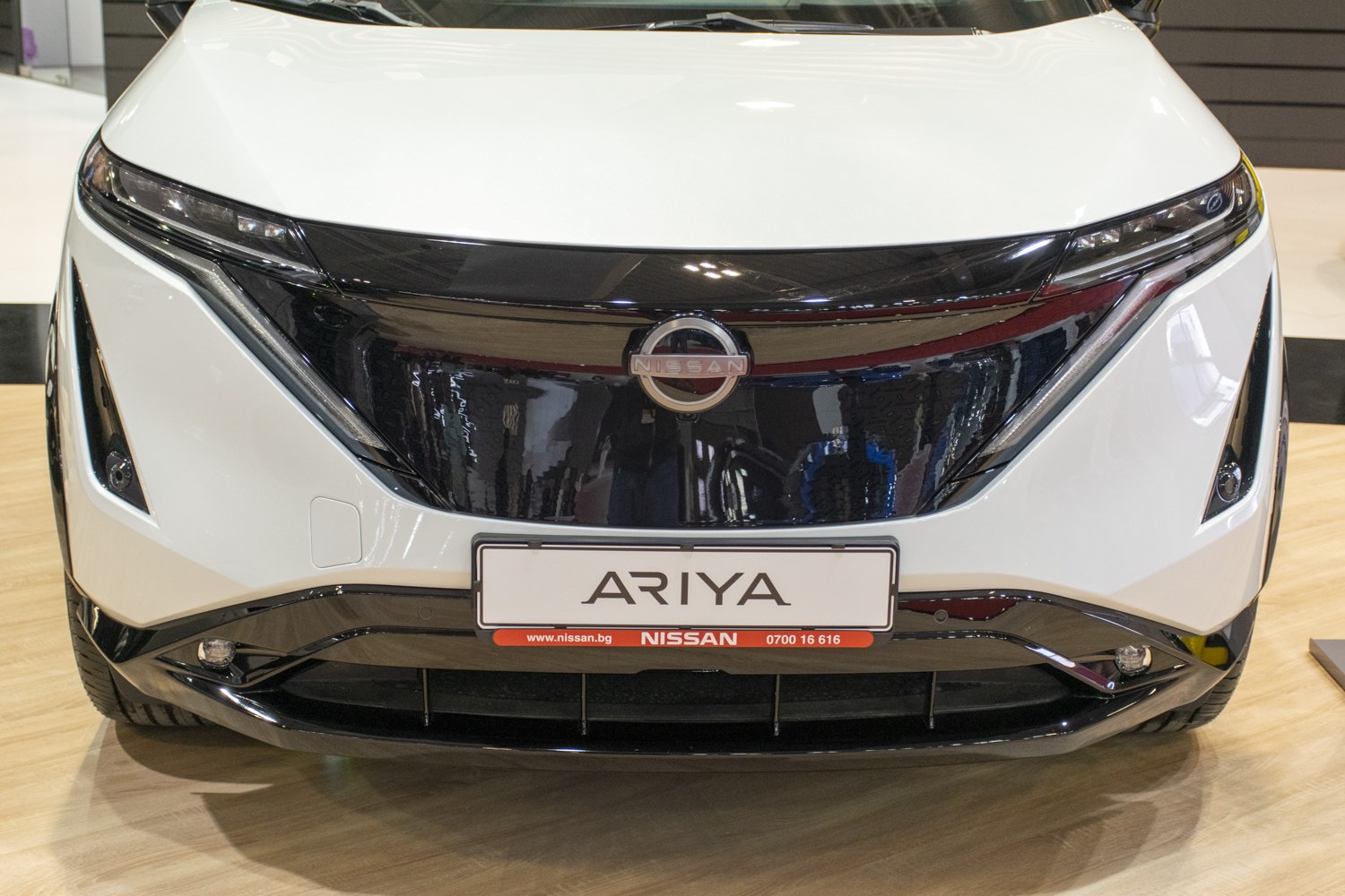 Close-up of front grille and sleek headlights