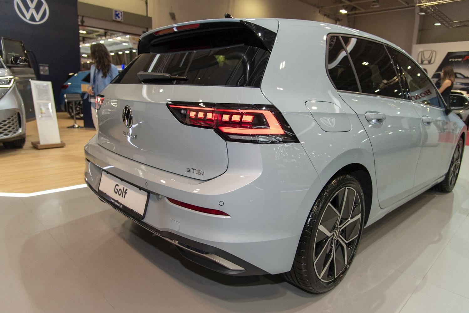 Rear LED taillights and aerodynamic wheel design of a hatchback.
