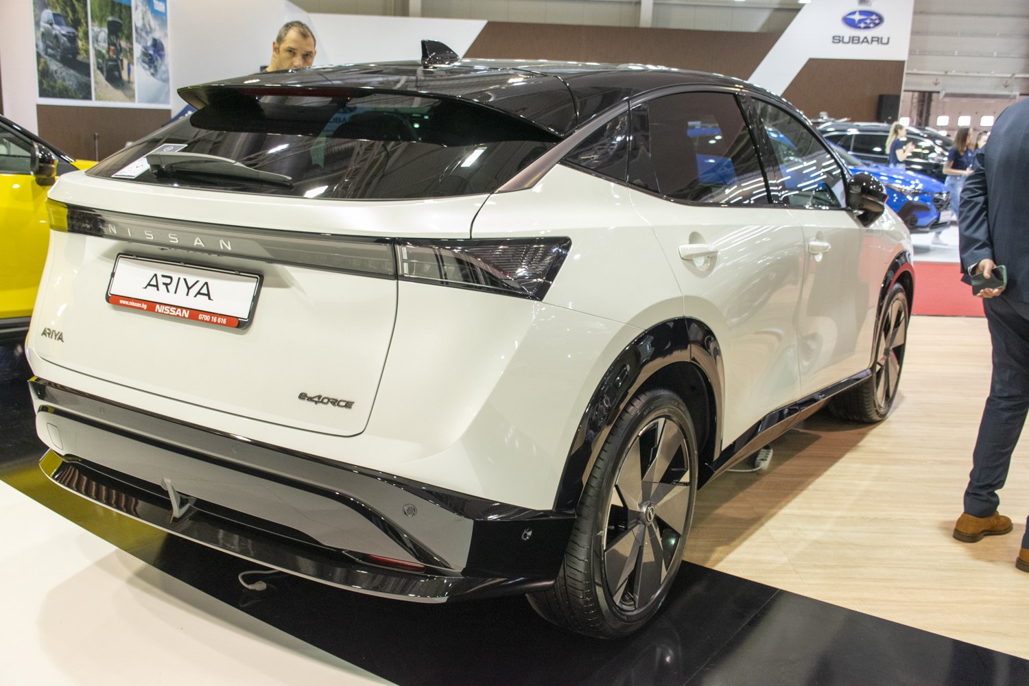 Sleek rear design with aerodynamic spoiler and futuristic taillights